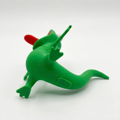 Green lizard figure, back view