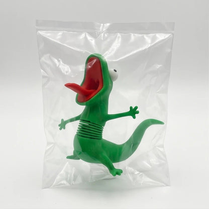Green lizard figure packaged in a clear bag